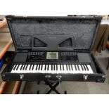 A Yamaha PSR-30 electric piano with fitted hard case and stand Condition Report: Available upon