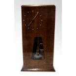 A clock with mecanno workings and wooden case Condition Report: Available upon request