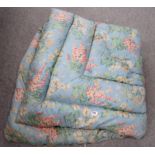 a quilted and feather filled floral blanket, approx 135 x 155 cm Condition Report: Not available for