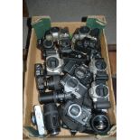 A collection of various camera bodies and various lenses etc Condition Report: Available upon