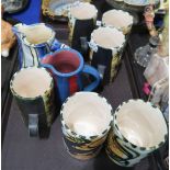 a selection of Newlyn celtic pottery cups, two studio pottery jugs Condition Report: Not available