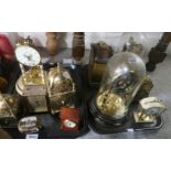 A lot comprising lantern clocks, glass dome mantle clocks, carriage clocks etc Condition Report: Not