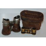 A pair of vintage binoculars and a pair of opera glasses (2) Condition Report: Available upon