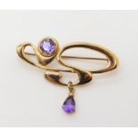A 9ct gold and amethyst Ortak Brooch, 4cm x 2.8cm, weight 4gms Condition Report: Available upon