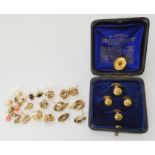 A boxed set of 9ct gold dress studs and a collection of gold and yellow metal earrings many (af)