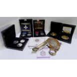 A lot comprising a cased replica Victoria Cross with a silver coin & a 9ct gold coin, a cased