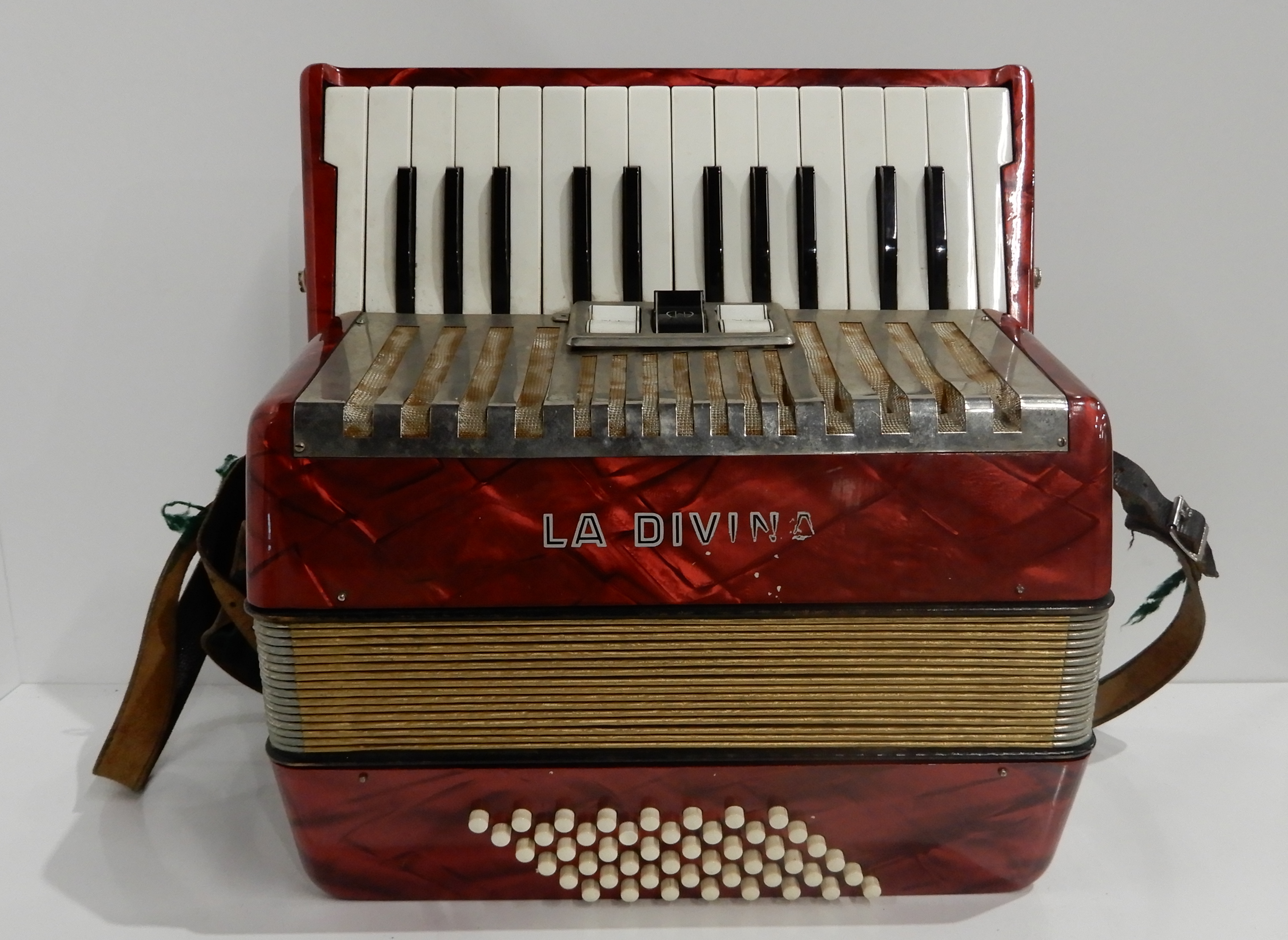 A La Divina 26 key 48 bass piano accordion with case Condition Report: Available upon request