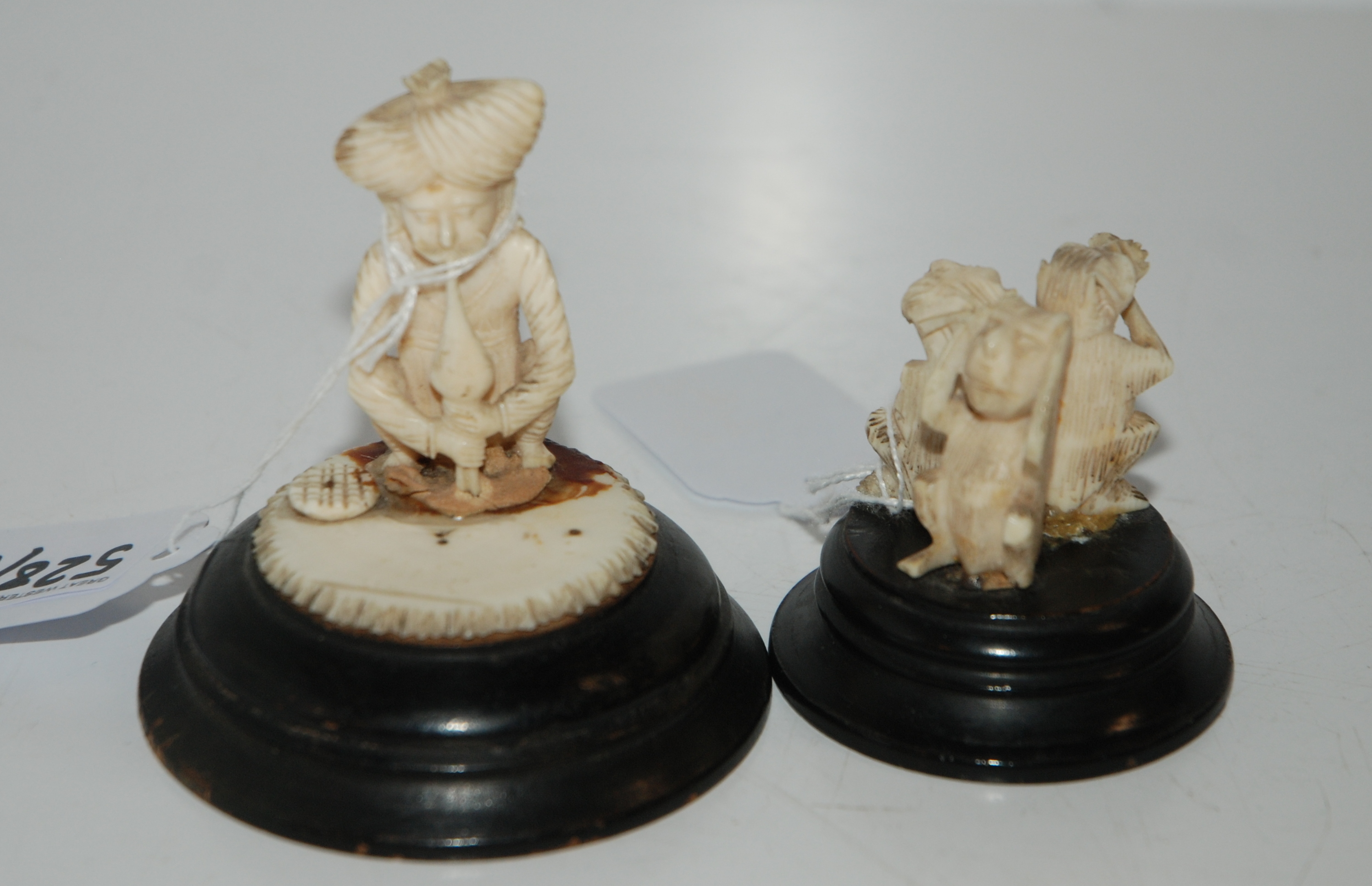 Carved three monkey figure group and snake charmer Condition Report: Available upon request