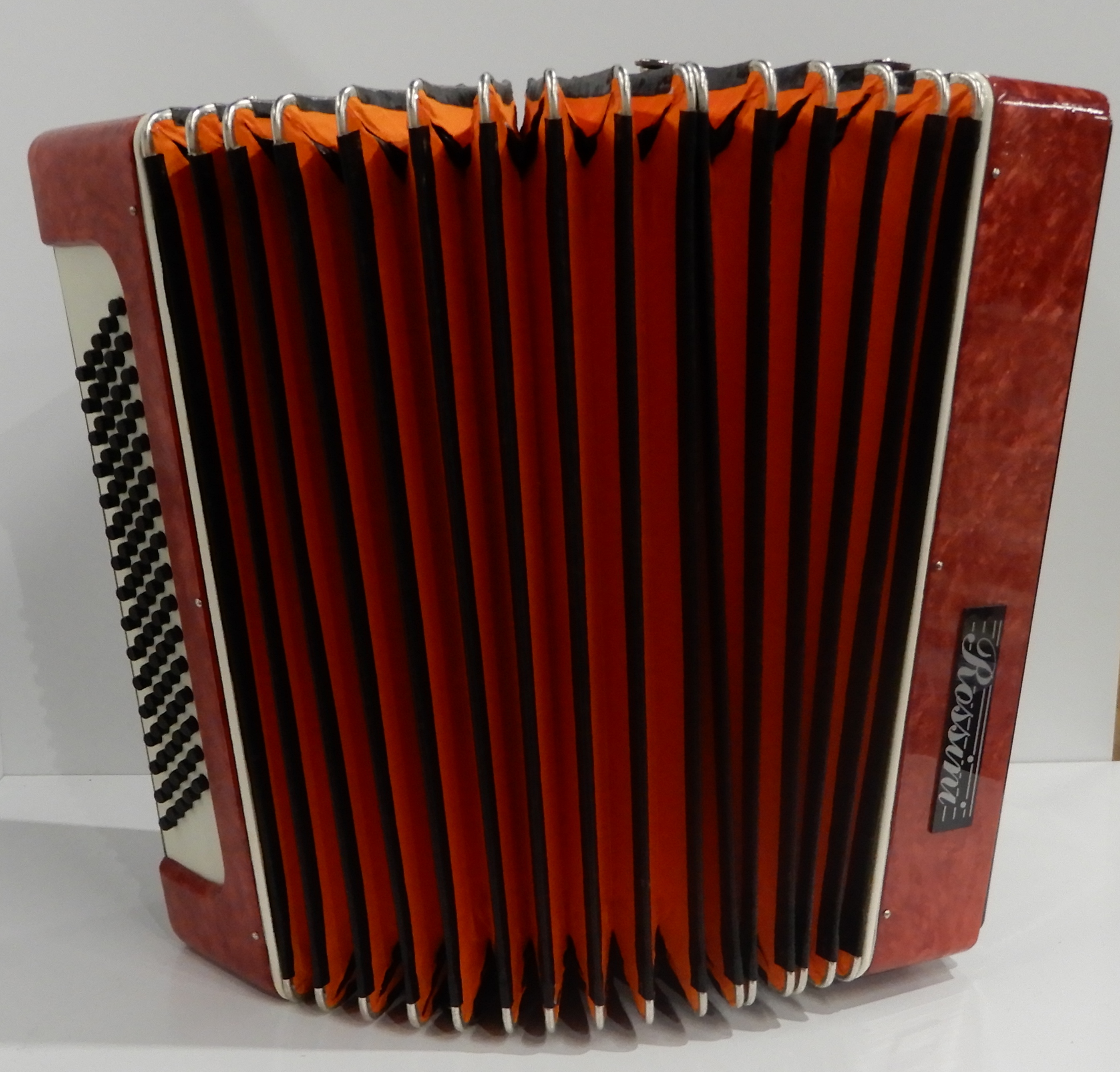 A Rossini Czechoslovakian accordion 34 key 80 bass with a case Condition Report: Available upon - Image 2 of 3