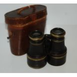 A pair of vintage binoculars in case Condition Report: Available upon request