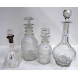 Four antique glass decanters including a triple ring neck example Condition Report: Available upon