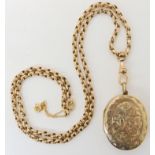 A vintage yellow metal locket and chain, weight 26.3gms Condition Report: Available upon request