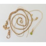 A 9ct gold peridot pendant and chain, a vintage belcher chain and other items of gold and yellow