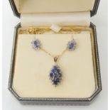 A 9ct gold sapphire and diamond cluster pendant and earring set, weight together 5.6gms Condition