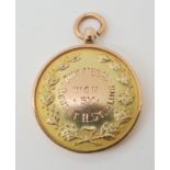 A 9ct gold Dux medal diameter 2.7cm, weight 11.5gms Condition Report: Available upon request