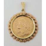 A Swiss 20 franc coin dated 1947 in 14k pendant mount, coin weighs 6.451gms of which 5.806gms are of