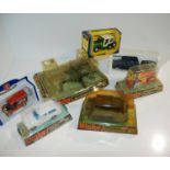 A box of various models including Dinky Static Gun, Bren Gun Carrier, Diesel Road Roller, Range