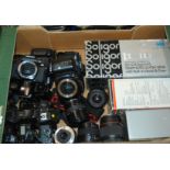 A collection of various camera bodies and lenses etc Condition Report: Available upon request