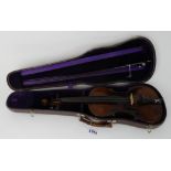 A two piece back violin 35.5 cm bearing label to the interior Antonius Stradiuvarius Cremonenfis