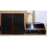 A Garrard Dynatron music center with two LS1434 speakers Condition Report: Available upon request