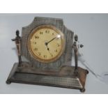 A silver table clock modelled as a dressing mirror rubbed Chester marks 11cm wide x 10cm high