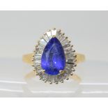 An 18ct gold 'Illiana' The Jewellery Channel tanzanite and diamond cluster ring,set with estimated