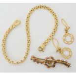 A 9ct gold bracelet, length 18.7cm, brooch and earrings, weight together 8.1gms Condition Report: