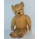 A vintage Teddy bear, 50cm high Condition Report: Available upon request