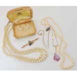 A 9ct Art Deco glass gem set necklace, a 9ct pearl and amethyst bug brooch, 9ct Ciro pearls and