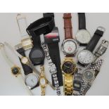 A collection of fashion watches Condition Report: Not available for this lot