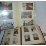 An album of postcards and a vintage photograph album Condition Report: Available upon request