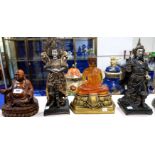 Two resin Buddha's and two Chinese figures Condition Report: Available upon request