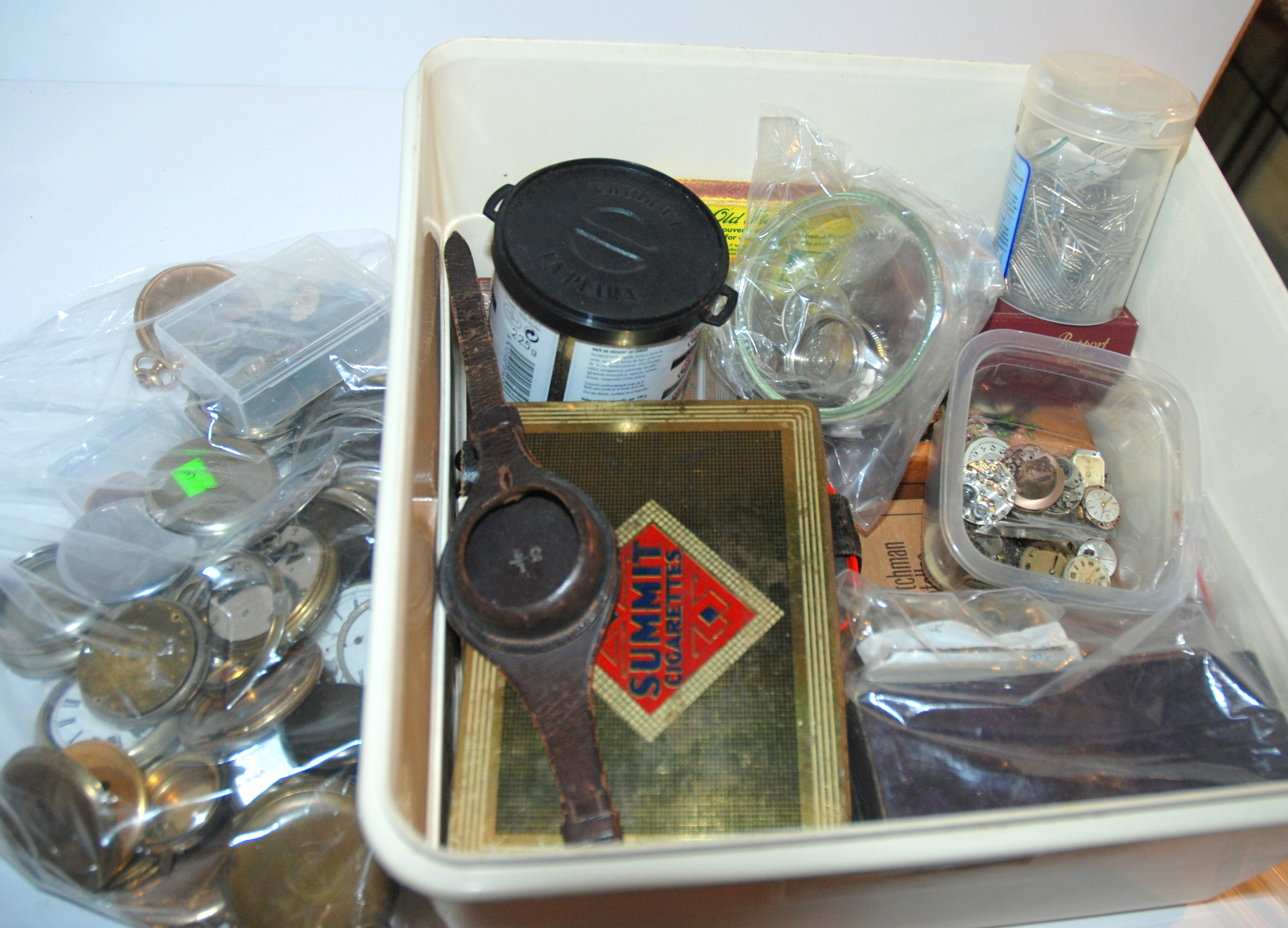 A collection of pocket watch parts etc Condition Report: Available upon request