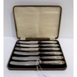 A cased set of six silver handled butter knives Condition Report: Available upon request