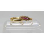A bright yellow metal ruby and diamond ring size N, together with a 18ct gold wedding ring, weight
