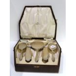 A cased seven piece silver backed dressing table set Sheffield 1931 Condition Report: Available upon