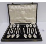 A cased set of twelve silver teaspoons with tongs London 1935 Condition Report: Available upon