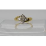 An 18ct gold diamond cluster ring set with estimated approx 0.25cts of brilliant cut diamonds,