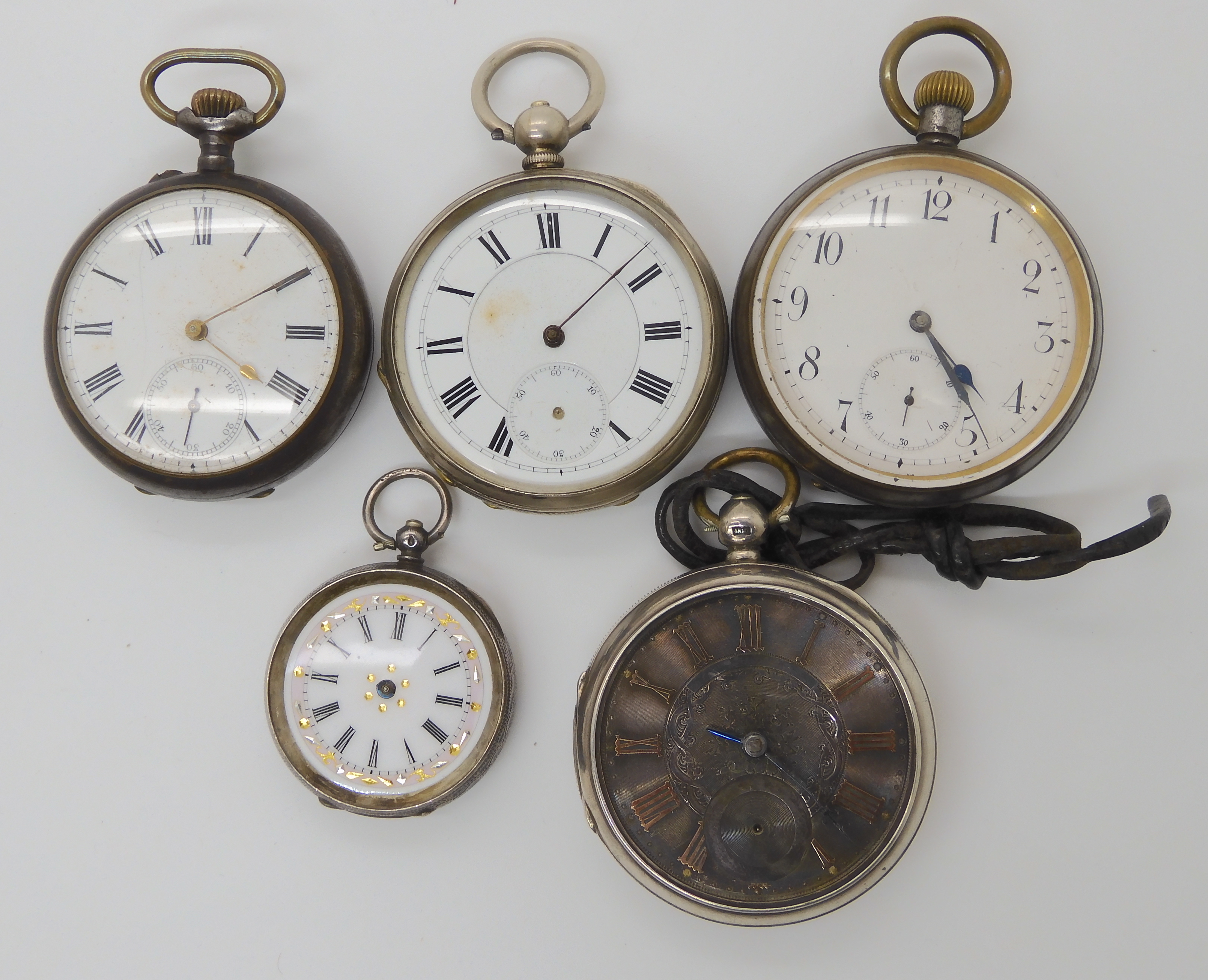 Two silver pocket watches, a silver fob watch and two in base metal all (af) Condition Report: Not