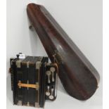 An International Made in Germany Trade Mark push button accordion together with a wooden violin case