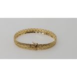 A 9ct gold fancy link bracelet, length 18.2cm, weight 11.6gms Condition Report: Available upon
