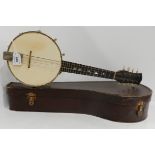 A metal body banjo-mandolin with case Condition Report: Available upon request