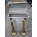 A cased pair of brass candlesticks Condition Report: Not available for this lot