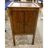 An early twentieth century oak gramophone cabinet Condition Report: Available upon request