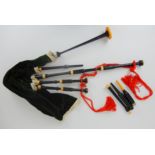 A set of 1/2 size bagpipes together with various chanters and bagpipe parts Condition Report: