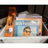 A quantity of vinyl LP records and 45 rpm vinyl records to include Roy Orbison, Peter Seger,