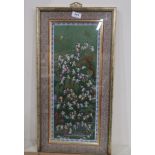 A framed Chinese embroidery depicting children playing amongst a landscape, 60 x 35 cm Condition