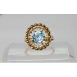 A 9ct gold retro blue zircon ring, size Q, weight 6.4gms Condition Report: Available upon request