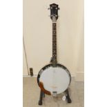A four string banjo Condition Report: Available upon request