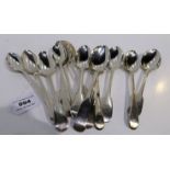 A lot comprising fourteen silver dessert spoons, assorted makers & hallmarks 516 grams total